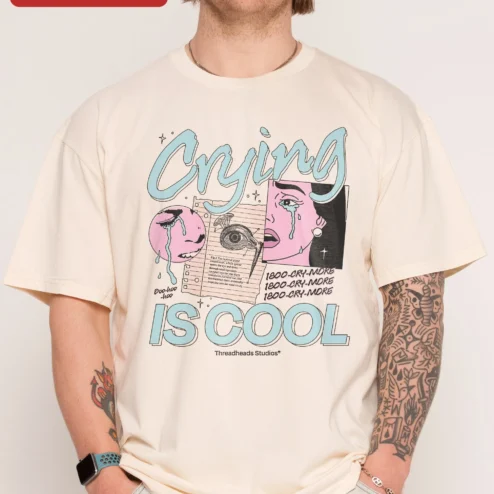 Crying IS COOL Tee Retro Collage Graphic T-Shirt Mental Health Awareness Gift for Gen Z on a hanger, ready to ship from Chicago, Illinois