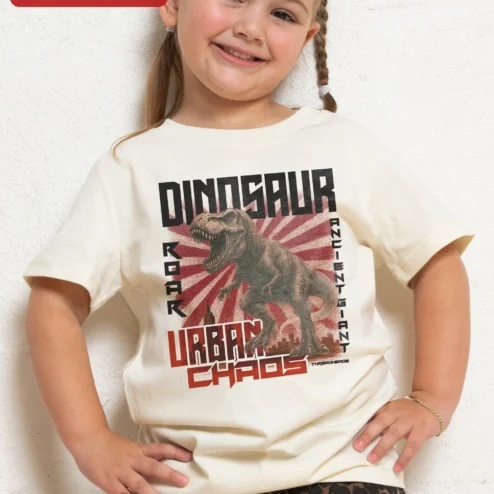 Dinosaur Roar Ancient Giant Urban Chaos T-Rex Graphic Tee for Kids on a hanger, ready to ship from Chicago, Illinois