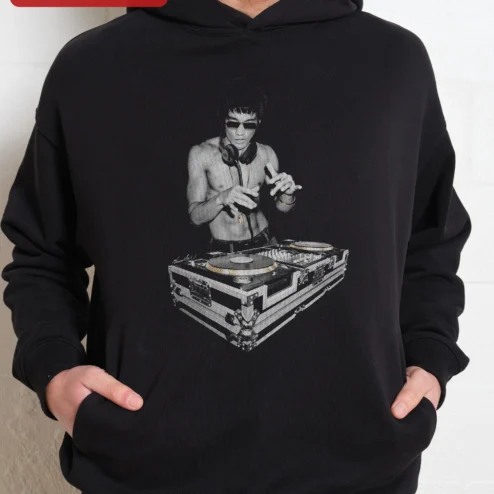Customer in Chicago, Illinois wearing DJ Turntable Music Hoodie Retro Vinyl Graphic Sweatshirt for DJs and Music Lovers