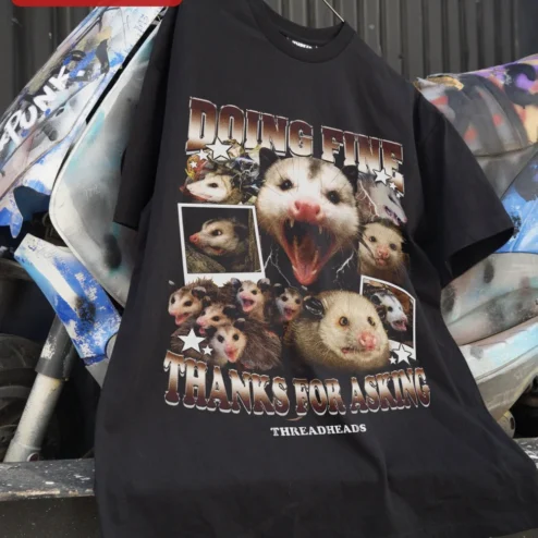 Customer in Chicago, Illinois wearing Doing Fine Thanks For Asking Opossum Graphic Tee Sarcastic Mental Health Humor Shirt