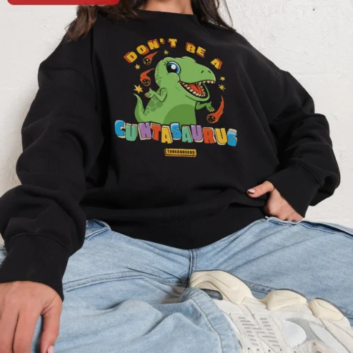 Don't Be A Guntasaurus Funny Dinosaur Sweatshirt Novelty Gift on a hanger, ready to ship from Chicago, Illinois