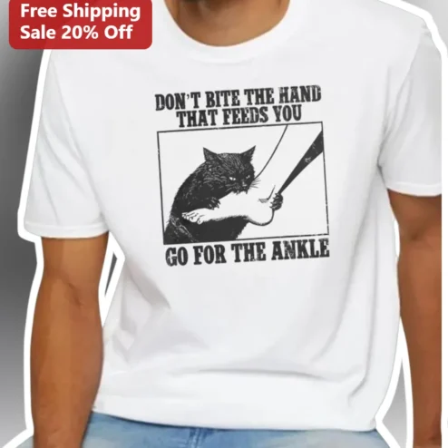 Don't Bite The Hand That Feeds You Go For The Ankle Funny Cat Lover Graphic Tee