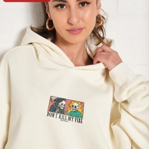 Close-up of Don't Kill My Vibe Hoodie Grim Reaper Skeleton Graphic Streetwear Pullover for streetwear fans in Chicago, Illinois
