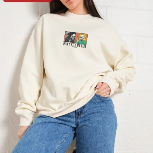 Close-up of Don't Kill My Vibe Skeleton Crewneck Sweatshirt Gothic Vintage Comic Style Streetwear for streetwear fans in Chicago, Illinois