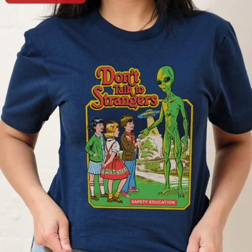 Close-up of Don't Talk to Strangers Safety Education Retro Alien Graphic Tee for streetwear fans in Chicago, Illinois
