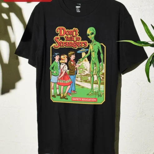 Close-up of Don't Talk to Strangers Safety Education Retro Alien Graphic Tee for streetwear fans in Chicago, Illinois