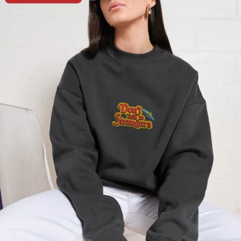 Don't Talk to Strangers Sweatshirt Retro 80s Music Fan Apparel Unisex Crewneck on a hanger, ready to ship from Chicago, Illinois