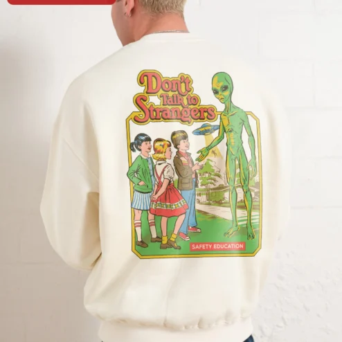 Close-up of Don't Talk to Strangers Sweatshirt Retro 80s Music Fan Apparel Unisex Crewneck for streetwear fans in Chicago, Illinois