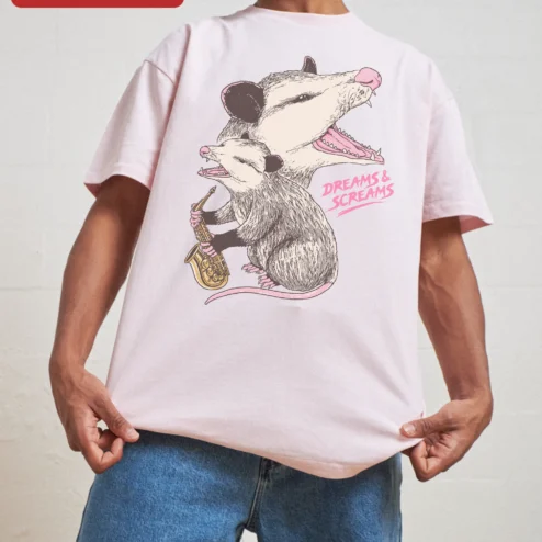 Dreams Screams Tee Opossum Playing Saxophone Funny Retro Animal Graphic T-Shirt for Music Lovers on a hanger, ready to ship from Chicago, Illinois