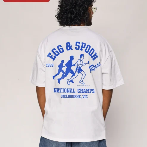 Close-up of Egg Spoon Race National Champs Melbourne VIC Retro Graphic Tee for streetwear fans in Chicago, Illinois