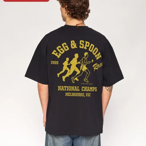 Customer in Chicago, Illinois wearing Egg Spoon Race National Champs Tee Funny Field Day Graphic Shirt for Women Men