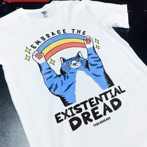 Customer in Chicago, Illinois wearing Embrace The Existential Dread Cat Tee Dark Humor Graphic T-Shirt Gift
