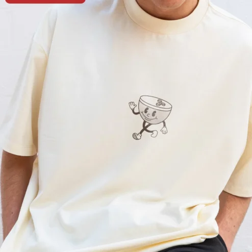 Espresso Martini Serve Me Ice Cold Retro Cartoon Graphic Tee for Cocktail Lovers on a hanger, ready to ship from Chicago, Illinois