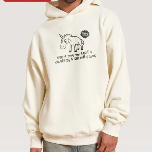 Every Time You Light A Cigarette A Unicorn Dies Hoodie Funny Anti-Smoking Gift for Smokers on a hanger, ready to ship from Chicago, Illinois