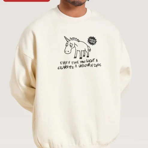 Every Time You Light A Cigarette A Unicorn Dies Sweatshirt Funny Sarcastic Gift for Smokers Dark Hum on a hanger, ready to ship from Chicago, Illinois