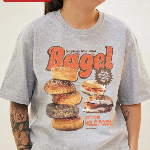Everything's Better With A Bagel Eat More Hole Foods Funny Food Pun Retro Ringer Tee on a hanger, ready to ship from Chicago, Illinois