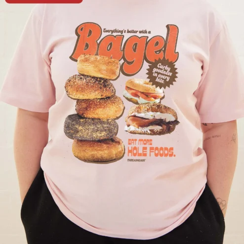 Customer in Chicago, Illinois wearing Everything's Better With A Bagel Eat More Hole Foods Funny Food Pun Retro Ringer Tee