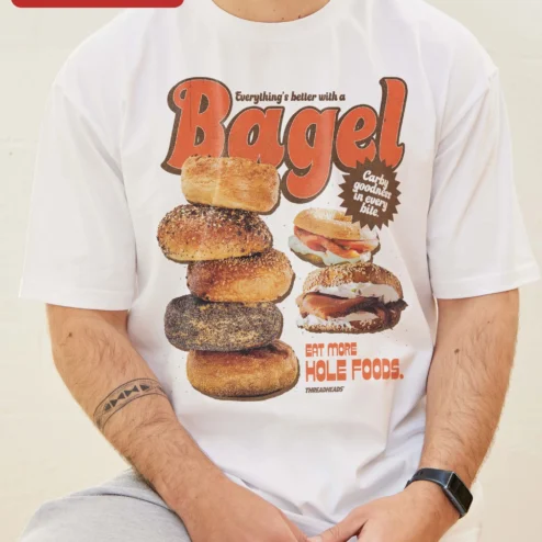 Close-up of Everything's Better With A Bagel Eat More Hole Foods Funny Food Pun Retro Ringer Tee for streetwear fans in Chicago, Illinois