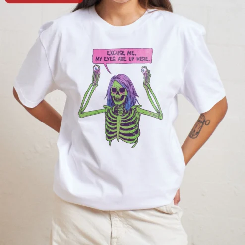 Customer in Chicago, Illinois wearing Excuse Me My Eyes Are Up Here Skeleton Graphic Tee Funny Halloween Spooky Humor Shirt for Women