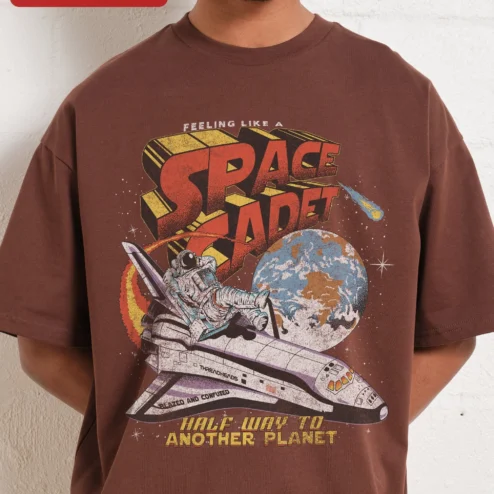 Feeling Like A Space Cadet Half Way To Another Planet Tee Retro Astronaut Graphic Shirt Sci-Fi Humor on a hanger, ready to ship from Chicago, Illinois