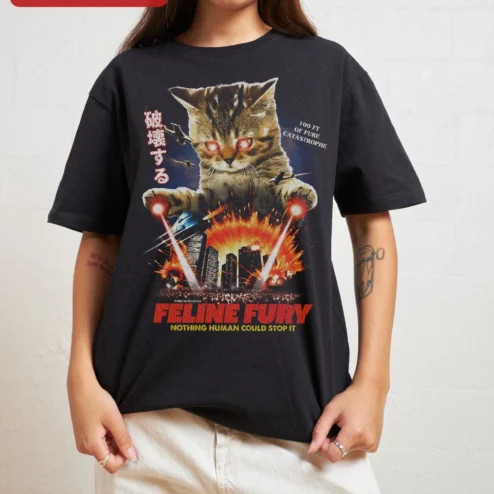 Customer in Chicago, Illinois wearing Feline Fury Nothing Human Could Stop It Cat Laser Eyes Graphic Tee