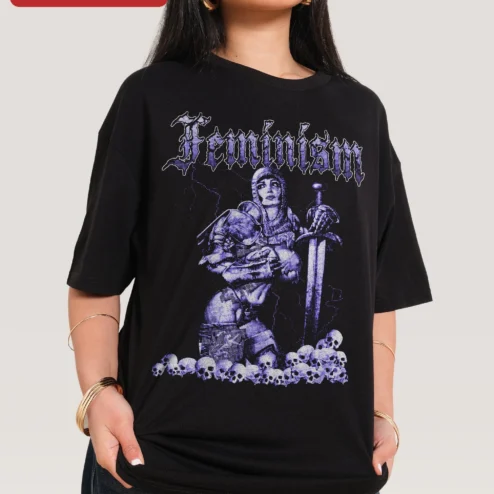 Feminism Warrior Woman Heavy Metal Graphic Tee Dark Punk Style Unisex Shirt on a hanger, ready to ship from Chicago, Illinois