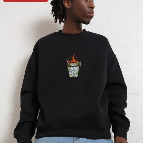 Flaming Cocktail Spicy Marg Sweatshirt Oversized Cream Pullover with Small Left Chest Graphic for Wo on a hanger, ready to ship from Chicago, Illinois