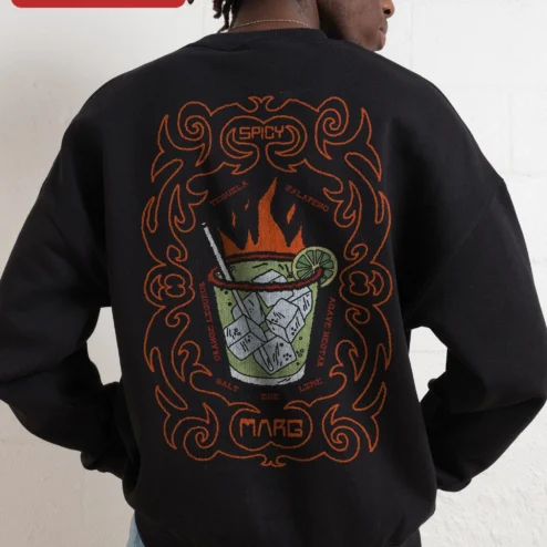 Customer in Chicago, Illinois wearing Flaming Cocktail Spicy Marg Sweatshirt Oversized Cream Pullover with Small Left Chest Graphic for Wo