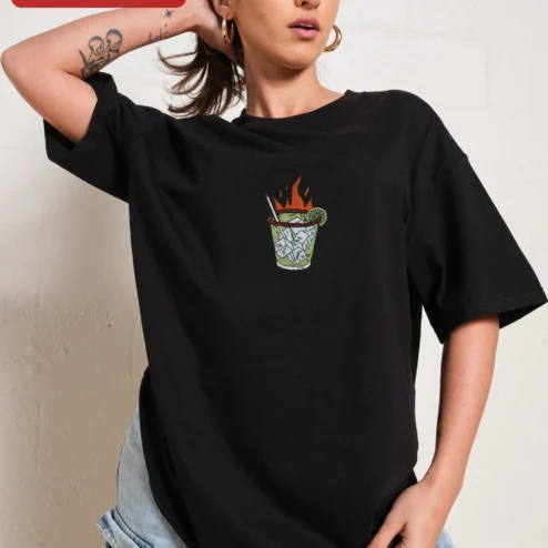 Customer in Chicago, Illinois wearing Flaming Tropical Cocktail Illustration Tee Retro Tiki Drink Graphic Shirt for Summer Party