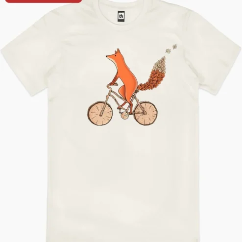 Customer in Chicago, Illinois wearing Fox Riding Autumn Leaf Bicycle Illustration Tee Whimsical Fall Nature Graphic Shirt for Women Men