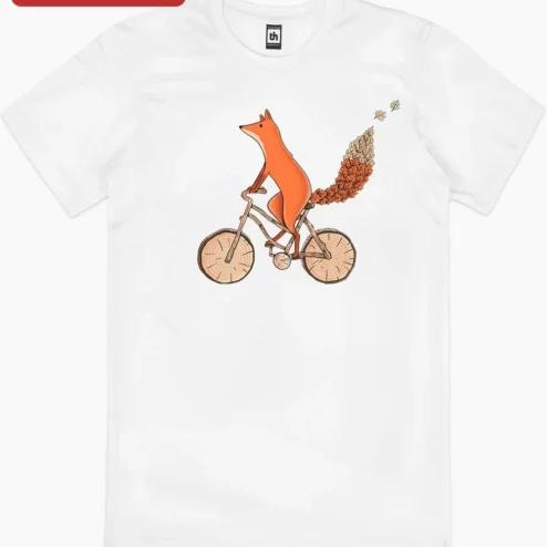 Close-up of Fox Riding Autumn Leaf Bicycle Illustration Tee Whimsical Fall Nature Graphic Shirt for Women Men for streetwear fans in Chicago, Illinois