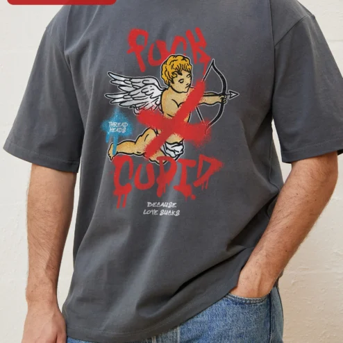 Fuck Cupid Because Love Sucks Tee Anti Valentines Day Gift Funny Sarcastic Grunge Graphic Shirt for on a hanger, ready to ship from Chicago, Illinois