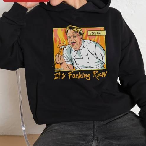 Close-up of Fuck Me It's Raw Gordon Ramsay Hoodie Funny Chef Graphic Pullover for streetwear fans in Chicago, Illinois