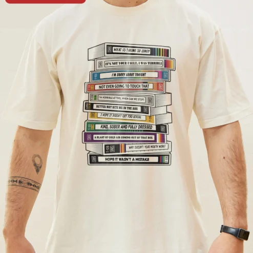 Funny Apology Quote Tee It's Not Your Fault I Was Terrible Sarcastic VHS Tape Graphic Shirt on a hanger, ready to ship from Chicago, Illinois
