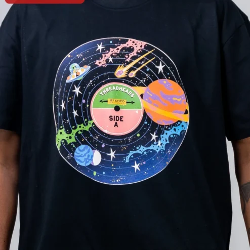 Customer in Chicago, Illinois wearing Galaxy Vinyl Record Tee Retro Space Music Lover Graphic Shirt for Men Women