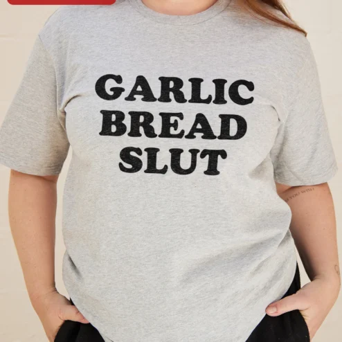 Garlic Bread Slut Funny Graphic Tee for Foodies on a hanger, ready to ship from Chicago, Illinois