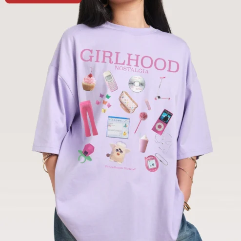 Customer in Chicago, Illinois wearing Girlhood Nostalgia Tee Y2K Retro Graphic T-Shirt Gift for Women