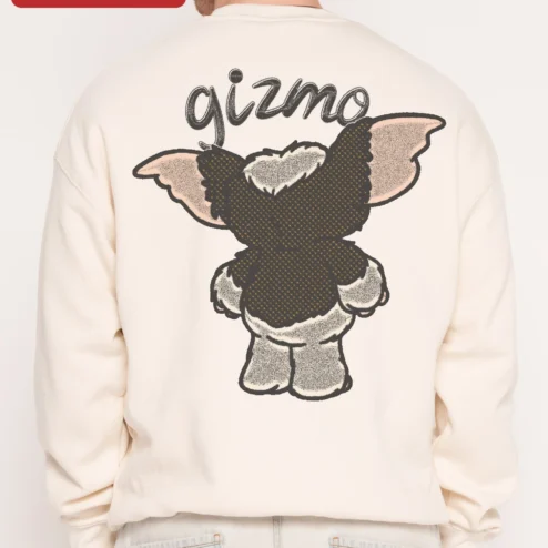 Gizmo Sweatshirt Gremlins Movie Fan Crewneck Retro Pop Culture Apparel on a hanger, ready to ship from Chicago, Illinois