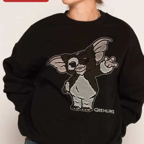 Customer in Chicago, Illinois wearing Gizmo Sweatshirt Gremlins Movie Fan Crewneck Retro Pop Culture Apparel