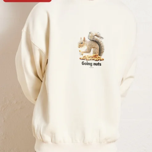 Going Nuts Sweatshirt Funny Squirrel Peanut Pun Crewneck Gift for Men Animal Lovers on a hanger, ready to ship from Chicago, Illinois