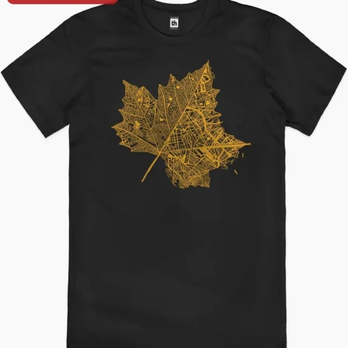 Customer in Chicago, Illinois wearing Gold Maple Leaf City Map Art Poster, Canadian Heritage Wall Decor, Gold and Black Urban Geography Pr