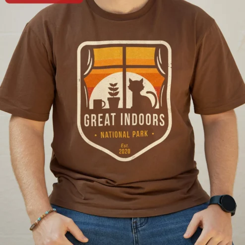 Great Indoors National Park Cat Lover Vintage Badge Tee for Introverts Homebodies on a hanger, ready to ship from Chicago, Illinois