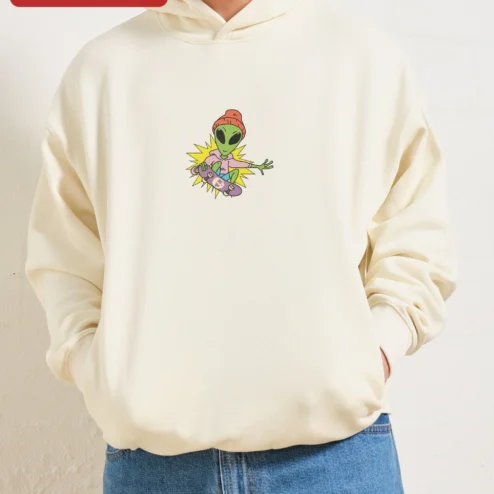 Close-up of Green Alien Skateboarding Hoodie Dark Grey Streetwear Graphic Pullover for streetwear fans in Chicago, Illinois