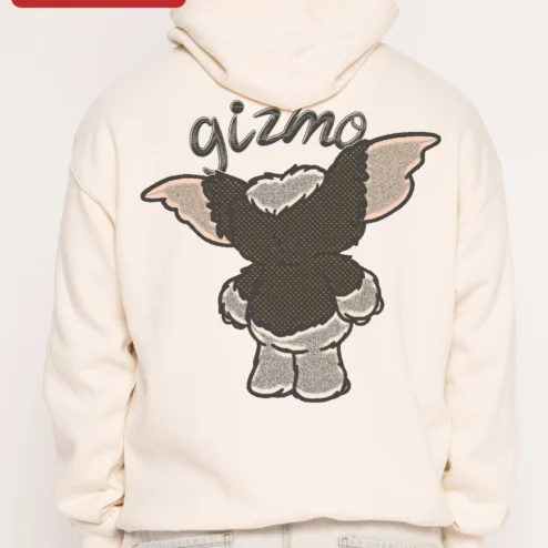 Gremlin Hoodie Gizmo Back Print Retro Horror Apparel for Men and Women on a hanger, ready to ship from Chicago, Illinois