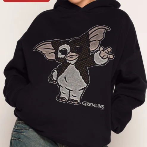 Customer in Chicago, Illinois wearing Gremlin Hoodie Gizmo Back Print Retro Horror Apparel for Men and Women