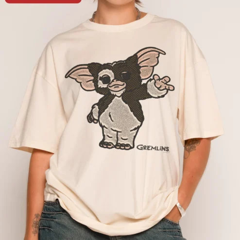 Customer in Chicago, Illinois wearing Gremlins Gizmo Wave Graphic Tee Retro 1984 Horror Comedy Movie Shirt Gift