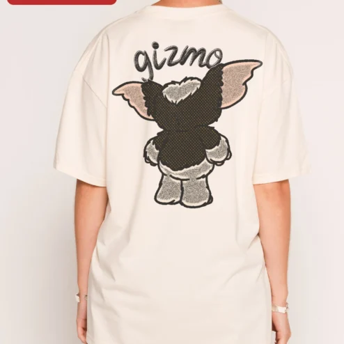 Customer in Chicago, Illinois wearing Gremlins Gizmo Wave Graphic Tee Retro 1984 Horror Comedy Movie Shirt Gift