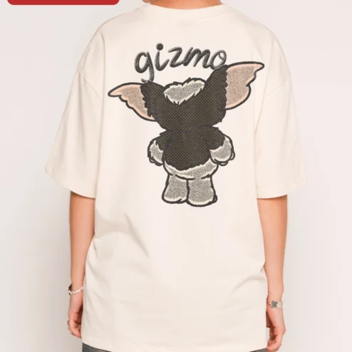 Customer in Chicago, Illinois wearing Gremlins Gizmo Wave Oversized Tee Retro 1984 Horror Movie Merch Gift for Men Women