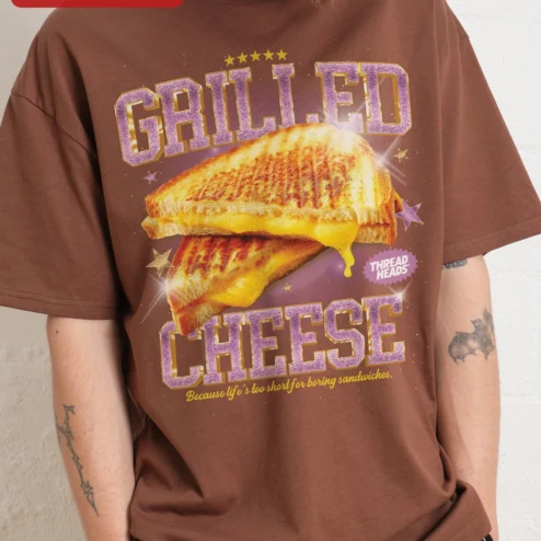 Close-up of Grilled Cheese Because Life's Too Short For Boring Sandwiches Funny Foodie Graphic Tee for streetwear fans in Chicago, Illinois