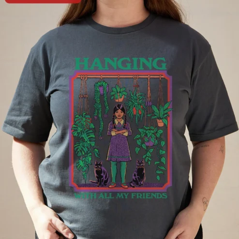 Hanging With All My Friends Wednesday Addams Graphic Tee Retro Goth Plant Mom Shirt on a hanger, ready to ship from Chicago, Illinois